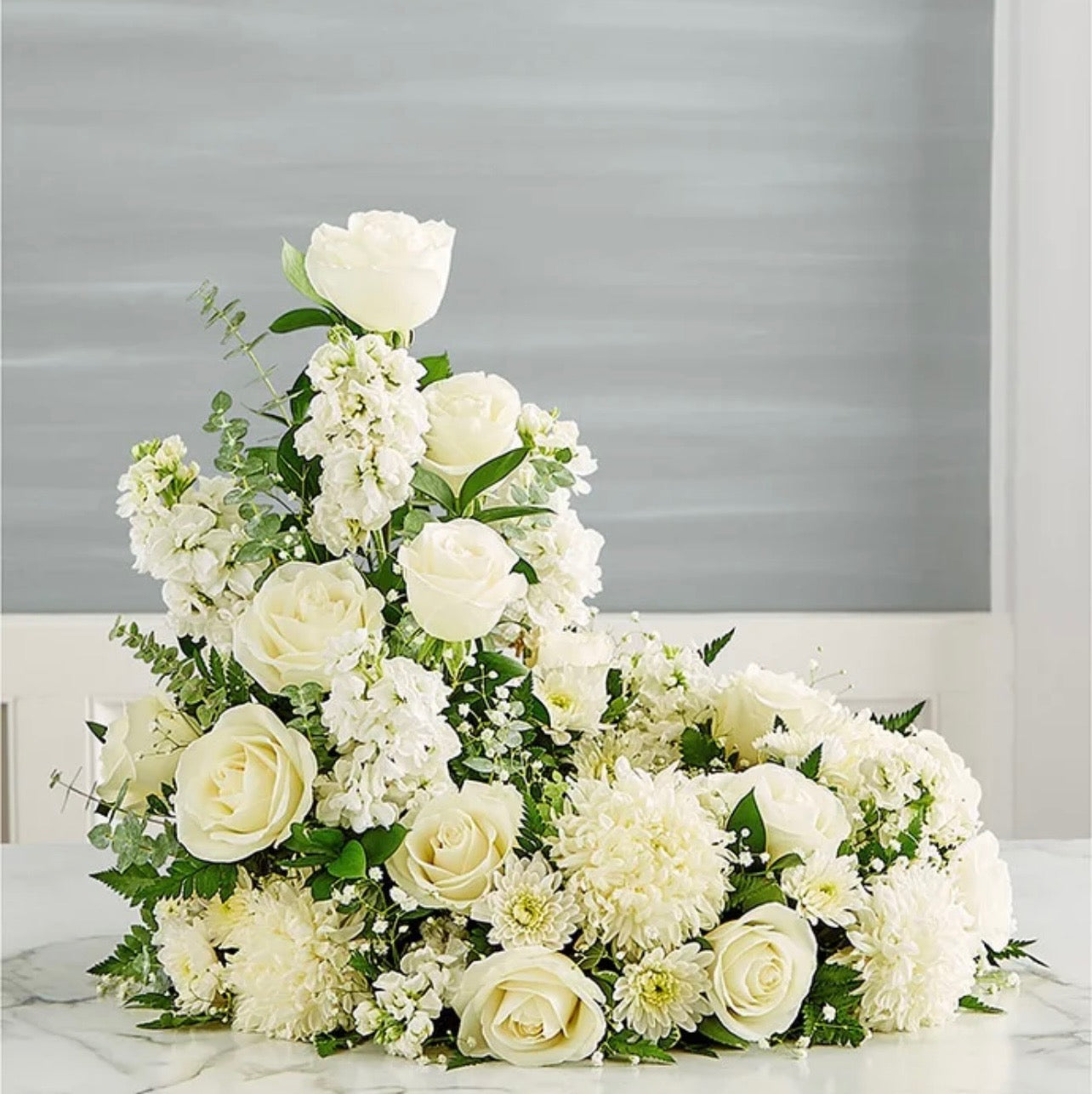 All White Cremation Wreath Display