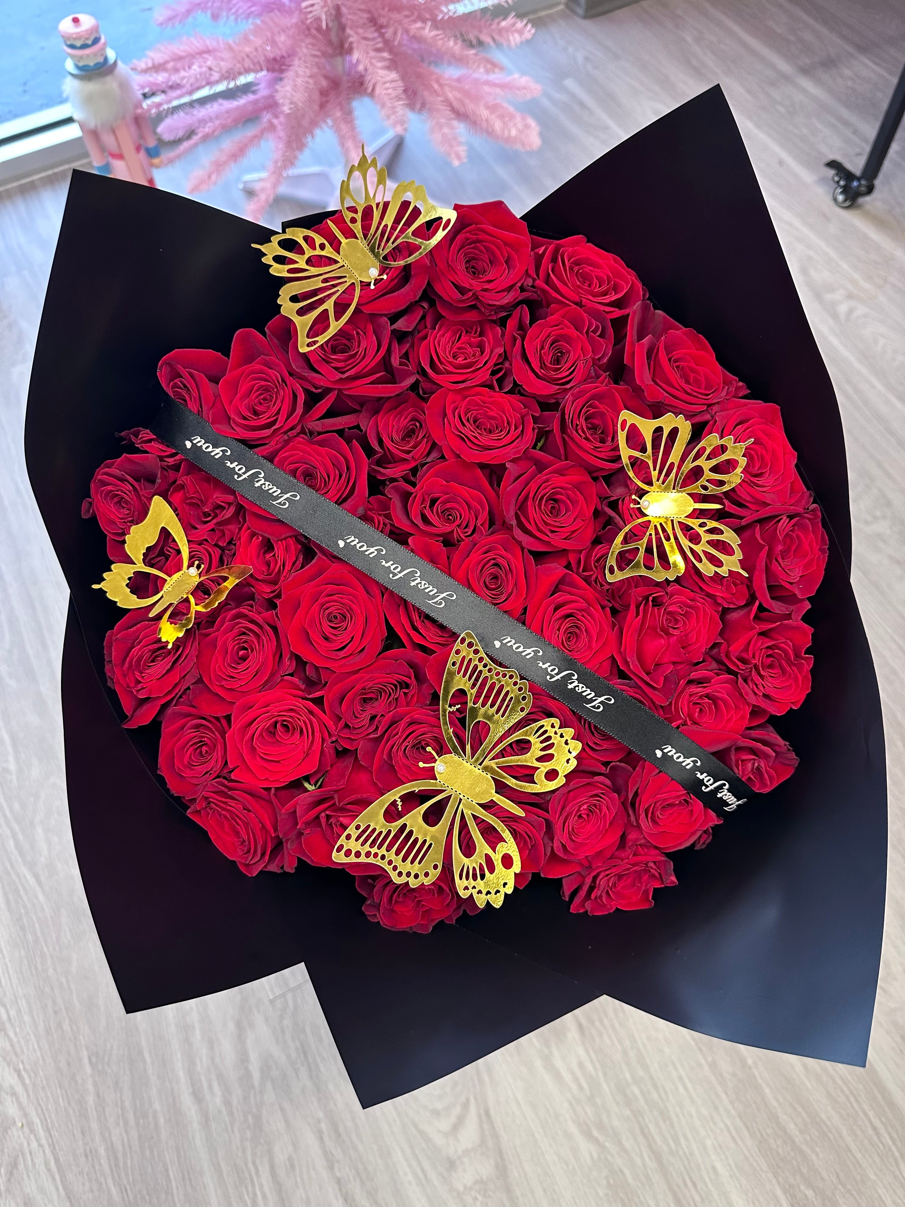 Red Rose Loose Wrap Paper Wrapped Bouquet in Monument, CO